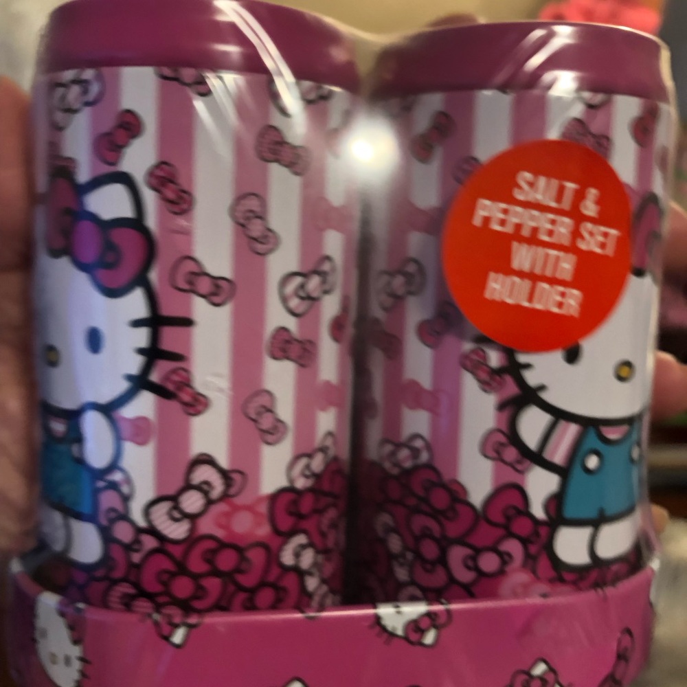 Sanrio Hello Kitty Salt & Pepper Shakers Pink and Blue Twin Metal Can Set
